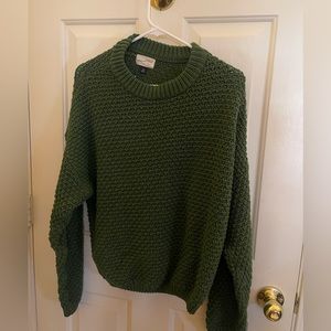 Green knitted sweater